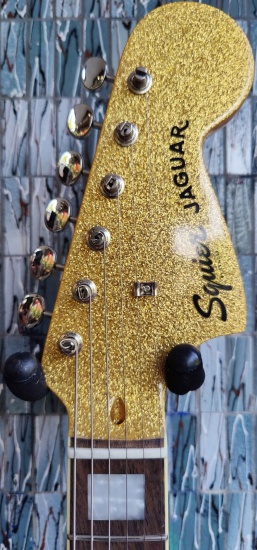 Squier FSR Limited Edition Classic Vibe '70s Jaguar, Matching Headstock, Gold Sparkle